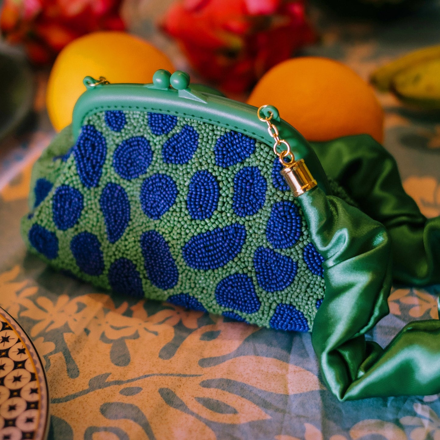 the Arnoldi Jade Clutch Bag In Lush Green & Blue